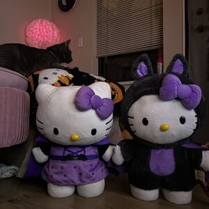 Hello Kitty Plush Dolls in Purple and Black Outfits